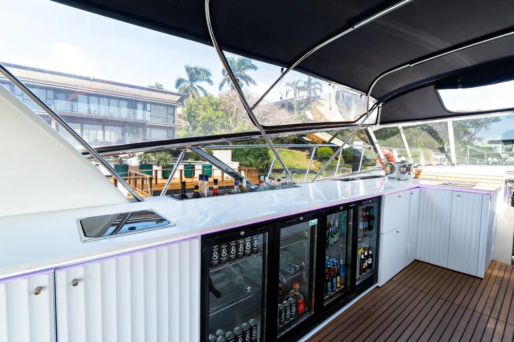 The aft deck bar on Bote with glass fronted drinks fridges