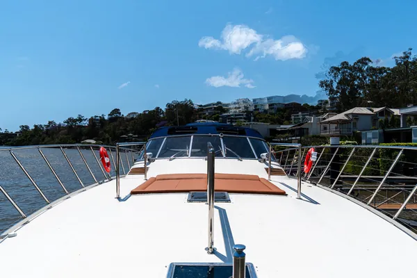 Bow sunpads on Bote looking forward over the river
